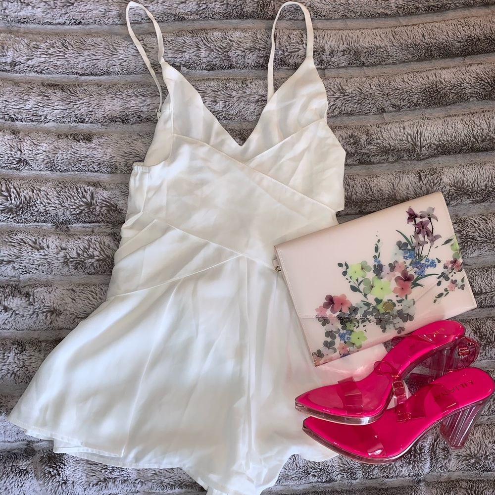 Super sexy, white romper.